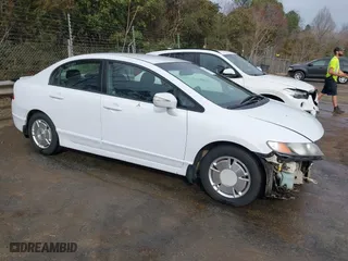 2010 Honda Civic Hybrid with VIN JHMFA3F20AS004930, listed as a IAAI auction lot 41776633 with 234,622 mi miles. Bid and sale history available at carsss.com. Image 1.