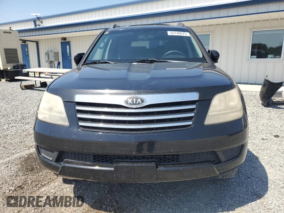 2009 Kia Borrego LX with VIN KNDJJ741395020692, listed as a Copart auction lot 52730975 with 217,861 mi miles and Salvage Title. Bid and sale history available at carsss.com. Image 5.