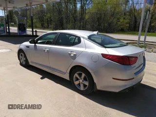 2014 Kia Optima LX with VIN 5XXGM4A70EG340051, listed as a IAAI auction lot 42048762 with 146,519 mi miles. Bid and sale history available at carsss.com. Image 3.