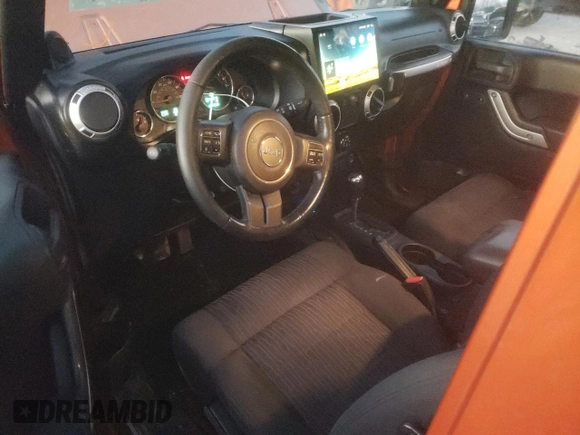 2011 Jeep Wrangler Sahara with VIN 1J4GA5D11BL627667, listed as a Copart auction lot 87227054 with 124,009 mi miles and Clean Title. Bid and sale history available at DreamBid. Image 8.