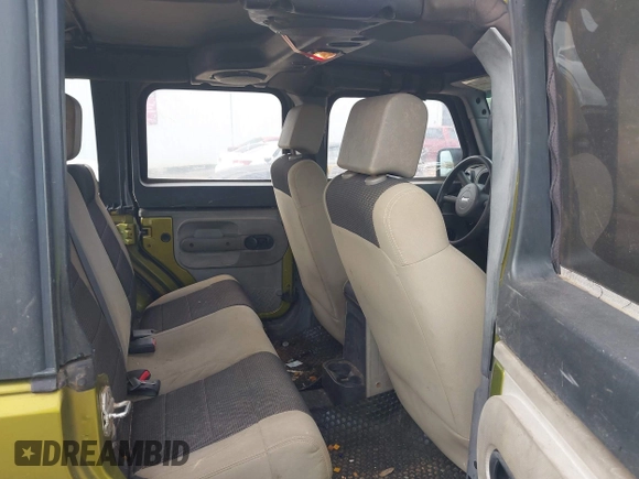 2007 Jeep Wrangler Unlimited X with VIN 1J4GA39177L164566, listed as a IAAI auction lot 42588655 with 50,915 mi miles and . Bid and sale history available at DreamBid. Image 8.