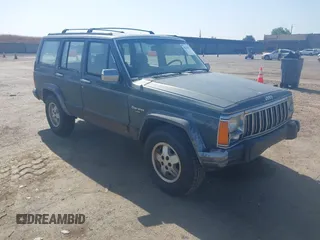 1992 Jeep Cherokee z VIN 1J4FJ58S7NL215269, wystawiony jako IAAI lot #42218723 z przebiegiem 268 925 mil mil oraz . Historia ofert i sprzedaży dostępna na DreamBid. Obrazek 1.