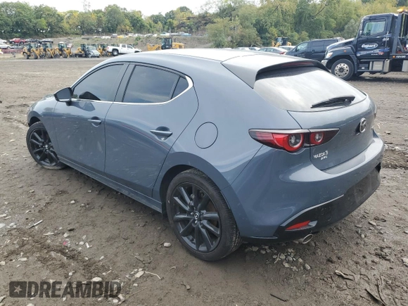 2023 Mazda 3 S Carbon Edition with VIN JM1BPBLM3P1618402, listed as a Copart auction lot 73179284 with 7,318 mi miles and Salvage title. Bid and sale history available at DreamBid. Image 2.