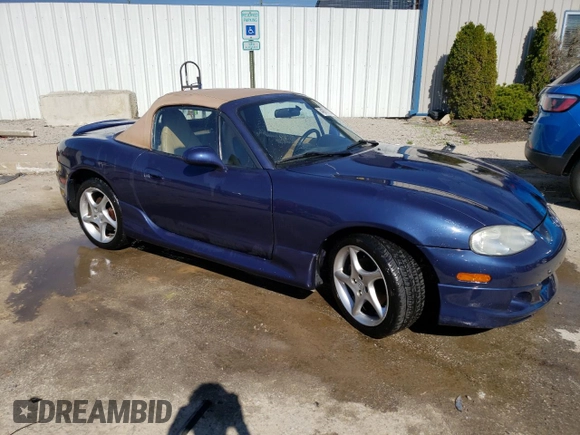 2002 Mazda MX-5 Miata Cloth z VIN JM1NB353820222664, wystawiony jako Copart lot #49701925 z przebiegiem 95 873 mil mil oraz Szkoda całkowita • Salvage title. Historia ofert i sprzedaży dostępna na DreamBid. Obrazek 4.