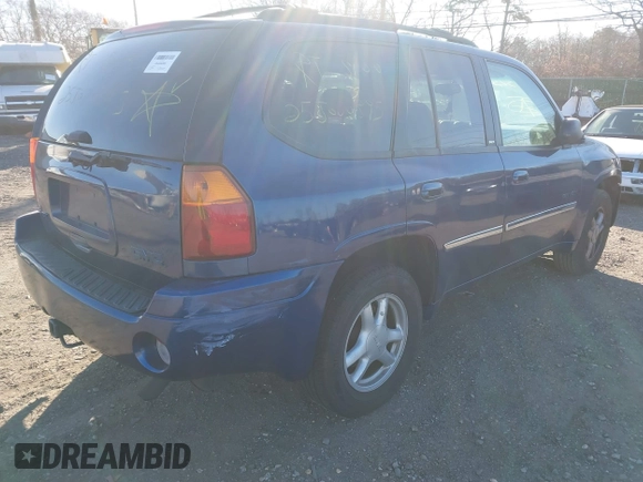 2006 GMC Envoy SLT with VIN 1GKDT13S762170322, listed as a IAAI auction lot 41324540 with 999,999 mi miles. Bid and sale history available at carsss.com. Image 4.
