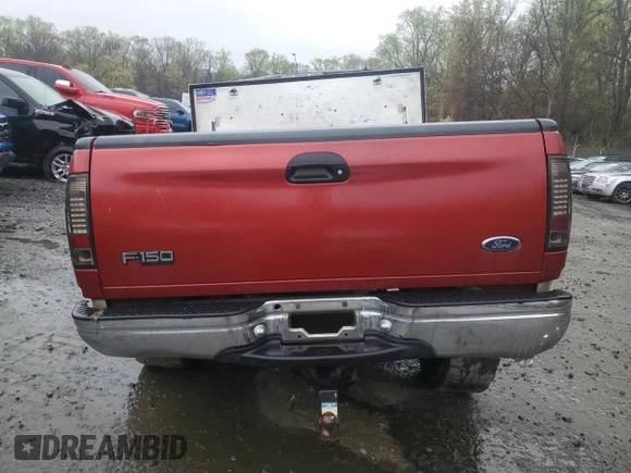 1999 Ford F-150 XL with VIN 1FTRX18L8XNB30435, listed as a Copart auction lot 51739345 with 0 mi miles and Salvage Title. Bid and sale history available at carsss.com. Image 6.
