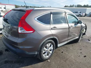 2014 Honda CR-V EX-L with VIN 2HKRM4H76EH638011, listed as a IAAI auction lot 41582396 with 147,614 mi miles. Bid and sale history available at carsss.com. Image 4.