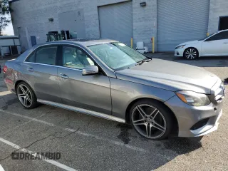 2014 Mercedes-Benz E with VIN WDDHF5KB6EA894140, listed as a Copart auction lot 48370675 with 102,032 mi miles and Salvage Title. Bid and sale history available at carsss.com. Image 4.