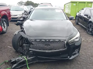 2015 Infiniti Q50 Premium with VIN JN1BV7AR1FM411864, listed as a IAAI auction lot 40800193 with 104,154 mi miles. Bid and sale history available at carsss.com. Image 11.