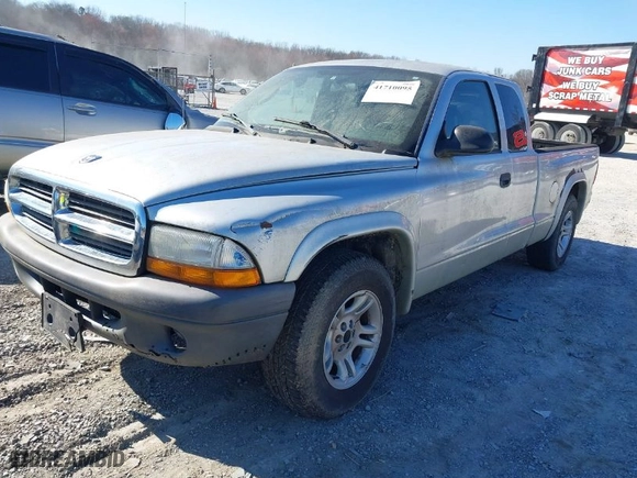 2004 Dodge Dakota with VIN 1D7GL12K34S524706, listed as a IAAI auction lot 41710095 with 310398 miles. Bid and sale history available at carsss.com. Image 2.