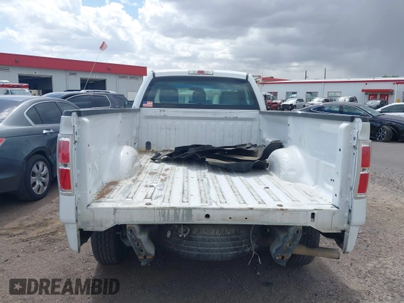 2014 Ford F-150 XL with VIN 1FTMF1CM4EKE98669, listed as a IAAI auction lot 41927986 with 133,246 mi miles and . Bid and sale history available at DreamBid. Image 16.