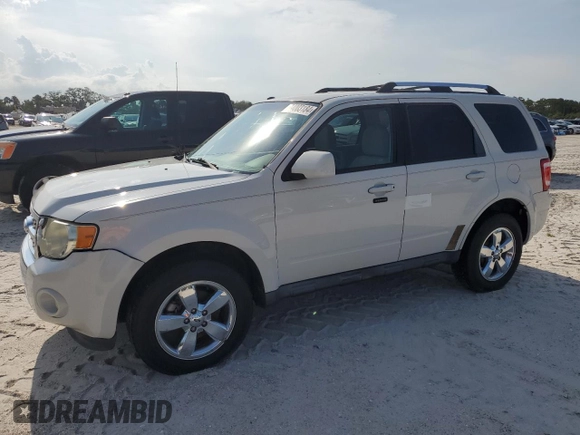2012 Ford Escape Limited with VIN 1FMCU0EG3CKB49563, listed as a Copart auction lot 74003184 with 115,060 mi miles and Salvage Title. Bid and sale history available at carsss.com. Image 1.