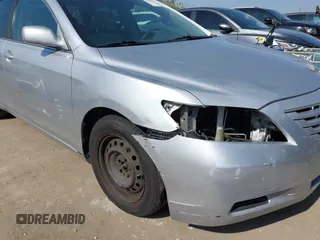 2007 Toyota Camry CE z VIN 4T1BE46K37U193771, wystawiony jako IAAI lot #42386583 z przebiegiem 166 233 mil mil oraz . Historia ofert i sprzedaży dostępna na DreamBid. Obrazek 6.