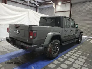2023 Jeep Gladiator Overland z VIN 1C6HJTFGXPL560873, wystawiony jako Copart lot #47033235 z przebiegiem Nie podano mil oraz Tytuł czysty. Historia ofert i sprzedaży dostępna na DreamBid. Obrazek 3.