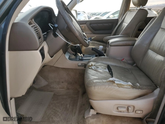 2000 Toyota Land Cruiser with VIN JT3HT05J1Y0096328, listed as a Copart auction lot 48390945 with 290,978 mi miles and Salvage Title. Bid and sale history available at carsss.com. Image 7.