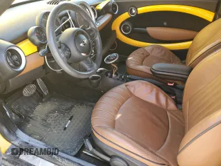 2015 MINI Roadster S z VIN WMWSY3C53FT595389, wystawiony jako Copart lot #77476814 z przebiegiem Nie podano mil oraz Szkody całkowita. Historia ofert i sprzedaży dostępna na DreamBid. Obrazek 7.