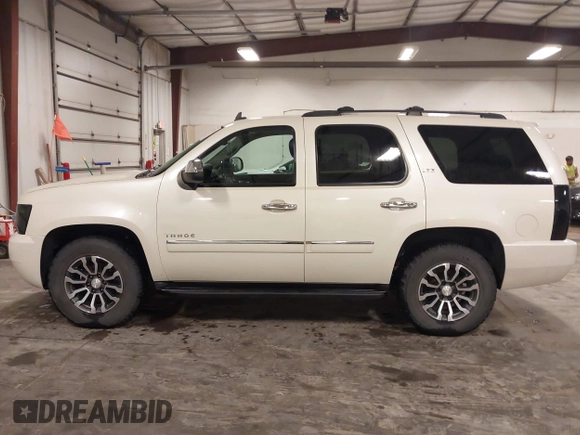 2012 Chevrolet Tahoe LTZ with VIN 1GNSKCE07CR227674, listed as a IAAI auction lot 42166732 with 204,171 mi miles and . Bid and sale history available at DreamBid. Image 14.