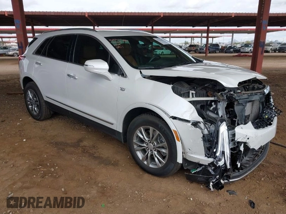 2021 Cadillac XT5 FWD Premium Luxury with VIN 1GYKNCRS5MZ224957, listed as a IAAI auction lot 41794648 with 28,540 mi miles and . Bid and sale history available at carsss.com. Image 1.