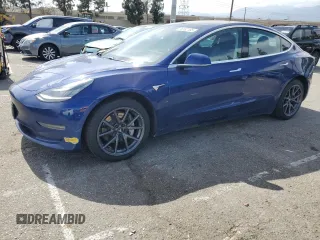 2020 Tesla Model 3 Long Range z VIN 5YJ3E1EB5LF744343, wystawiony jako Copart lot #56582165 z przebiegiem 112 623 mil mil oraz Szkoda całkowita • Salvage title. Historia ofert i sprzedaży dostępna na DreamBid. Obrazek 1.
