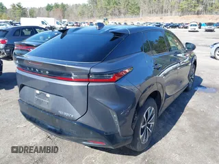2024 Lexus RZ 300e Premium z VIN JTJABABB7RA002691, wystawiony jako IAAI lot #41999231 z przebiegiem 5515 mil mil oraz . Historia ofert i sprzedaży dostępna na DreamBid. Obrazek 4.