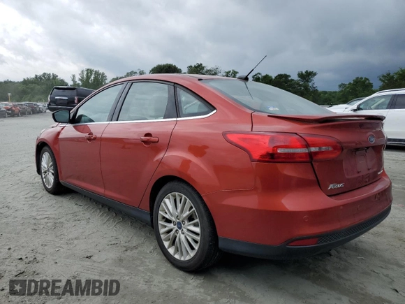 2018 Ford Focus Titanium with VIN 1FADP3J26JL284299, listed as a Copart auction lot 58908325 with 79,331 mi miles and Salvage title. Bid and sale history available at DreamBid. Image 2.