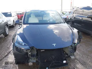 2024 Tesla Model Y Long Range with VIN 7SAYGDEE0RA300064, listed as a IAAI auction lot 41640541 with 5,049 mi miles and . Bid and sale history available at DreamBid. Image 13.