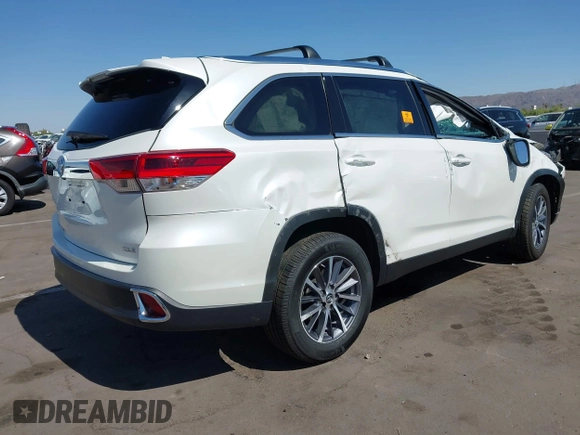 2019 Toyota Highlander SE with VIN 5TDKZRFH0KS314263, listed as a IAAI auction lot 42174469 with 72,682 mi miles and . Bid and sale history available at DreamBid. Image 4.