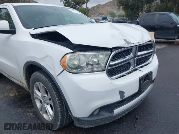 2013 Dodge Durango SXT z VIN 1C4RDHAG7DC694986, wystawiony jako IAAI lot #42181381 z przebiegiem 170 669 mil mil oraz . Historia ofert i sprzedaży dostępna na DreamBid. Obrazek 17.