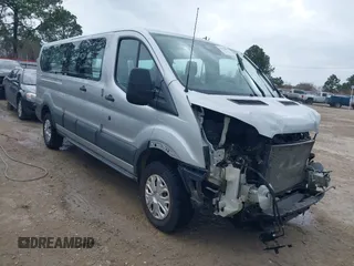 2018 Ford Transit Passenger XL with VIN 1FBZX2ZMXJKB02176, listed as a IAAI auction lot 41455827 with 75,340 mi miles and . Bid and sale history available at DreamBid. Image 1.