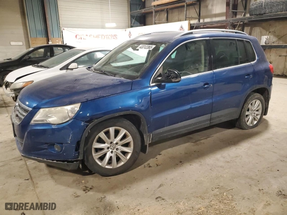 2009 Volkswagen Tiguan S with VIN WVGAV75N99W001723, listed as a Copart auction lot 43312365 with 193,171 mi miles and Salvage Title. Bid and sale history available at carsss.com. Image 1.