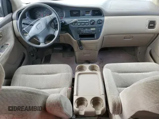2000 Honda Odyssey LX z VIN 2HKRL1850YH575430, wystawiony jako Copart lot #53260255 z przebiegiem 188 847 mil mil oraz Szkoda całkowita • Salvage title. Historia ofert i sprzedaży dostępna na DreamBid. Obrazek 8.