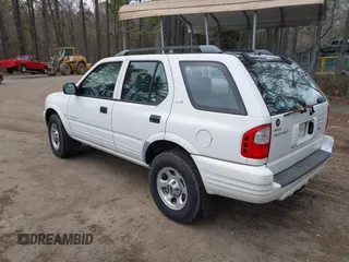 2000 Isuzu Rodeo S with VIN 4S2CK58W5Y4353808, listed as a IAAI auction lot 41723054 with 159,863 mi miles. Bid and sale history available at carsss.com. Image 3.