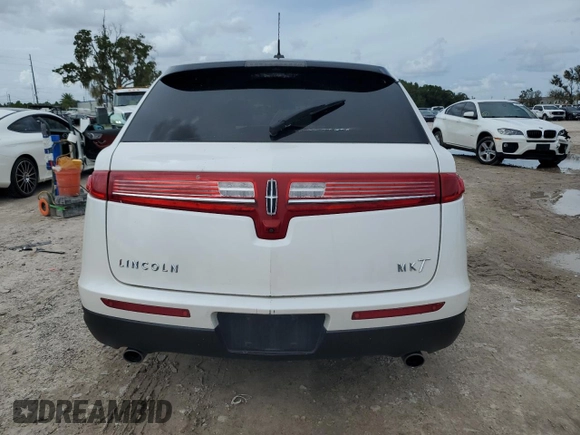 2014 Lincoln MKT with VIN 2LMHJ5FK5EBL57377, listed as a Copart auction lot 70608694 with 115,053 mi miles and Salvage Title. Bid and sale history available at DreamBid. Image 6.