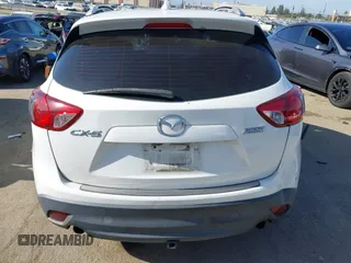 2013 Mazda CX-5 Sport with VIN JM3KE2BE4D0153251, listed as a IAAI auction lot 42297235 with 177,019 mi miles and . Bid and sale history available at DreamBid. Image 16.