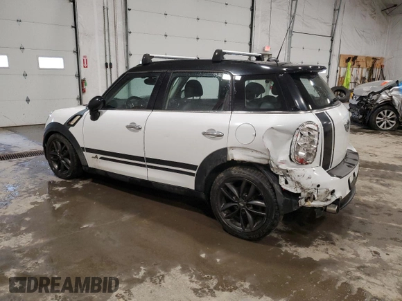 2013 MINI Countryman S ALL4 with VIN WMWZC5C56DWM15763, listed as a Copart auction lot 51165565 with 165,494 mi miles and Salvage Title. Bid and sale history available at DreamBid. Image 2.