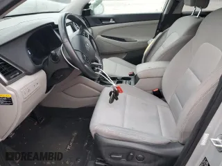 2018 Hyundai Tucson Value with VIN KM8J33A28JU748241, listed as a Copart auction lot 87492464 with 56,457 mi miles and Salvage Title. Bid and sale history available at carsss.com. Image 7.