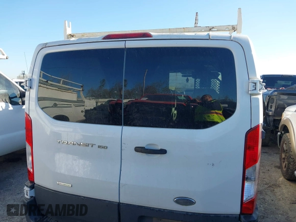 2015 Ford Transit Cargo with VIN 1FTNE1YGXFKA66907, listed as a IAAI auction lot 41605119 with 305,897 mi miles and . Bid and sale history available at DreamBid. Image 16.