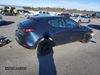2019 Mazda 3 with VIN JM1BPBJM2K1131512, listed as a Copart auction lot 87112664 with Not provided miles and Salvage title. Bid and sale history available at DreamBid. Image 3.