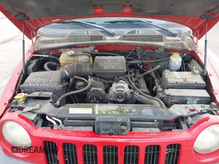 2003 Jeep Liberty Sport with VIN 1J4GL48K03W608325, listed as a IAAI auction lot 42033270 with 210,609 mi miles. Bid and sale history available at carsss.com. Image 10.