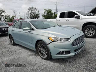 2013 Ford Fusion SE Hybrid z VIN 3FA6P0LU6DR174719, wystawiony jako Copart lot #62877715 z przebiegiem 52 884 mil mil oraz Szkoda całkowita • Salvage title. Historia ofert i sprzedaży dostępna na DreamBid. Obrazek 4.