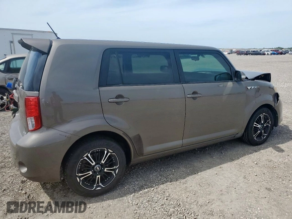 2012 Scion xB z VIN JTLZE4FE3CJ016375, wystawiony jako Copart lot #56891175 z przebiegiem 150 731 mil mil oraz Szkody całkowita. Historia ofert i sprzedaży dostępna na DreamBid. Obrazek 3.