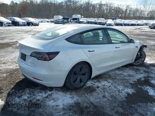 2023 Tesla Model 3 Long Range with VIN 5YJ3E1EBXPF392818, listed as a IAAI auction lot 41346835 with 31,750 mi miles and . Bid and sale history available at DreamBid. Image 4.