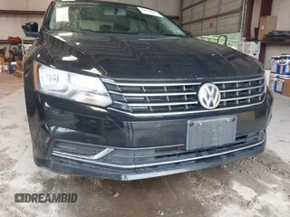 2016 Volkswagen Passat SE z VIN 1VWBT7A38GC010301, wystawiony jako IAAI lot #42316812 z przebiegiem 154 618 mil mil oraz . Historia ofert i sprzedaży dostępna na DreamBid. Obrazek 6.