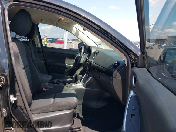 2014 Mazda CX-5 Sport with VIN JM3KE2BE9E0402015, listed as a IAAI auction lot 42098197 with 65,328 mi miles and . Bid and sale history available at carsss.com. Image 5.