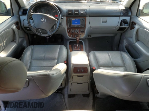 2000 Mercedes-Benz M 320/430/500 with VIN 4JGAB72E2YA185234, listed as a Copart auction lot 83479684 with 209,491 mi miles and Clean title. Bid and sale history available at DreamBid. Image 8.