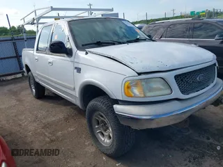 2001 Ford F-150 XLT with VIN 1FTRW08L11KE87848, listed as a IAAI auction lot 42100351 with Not provided miles and . Bid and sale history available at DreamBid. Image 1.