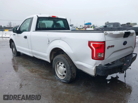 2016 Ford F-150 XL with VIN 1FTMF1C89GKF71802, listed as a IAAI auction lot 41557014 with 129,794 mi miles. Bid and sale history available at carsss.com. Image 3.