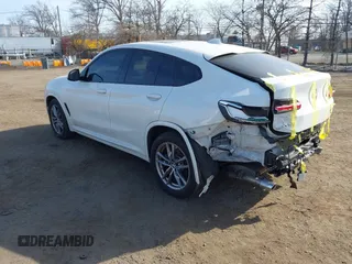 2021 BMW X4 xDrive30i z VIN 5UX2V1C01M9F26524, wystawiony jako IAAI lot #41805153 z przebiegiem 40 353 mil mil oraz . Historia ofert i sprzedaży dostępna na DreamBid. Obrazek 3.