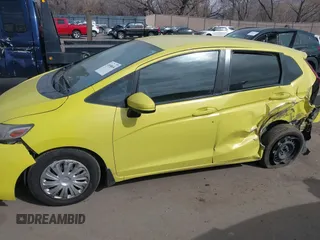 2016 Honda Fit LX z VIN JHMGK5H5XGX033643, wystawiony jako IAAI lot #41690636 z przebiegiem 148 441 mil mil oraz . Historia ofert i sprzedaży dostępna na DreamBid. Obrazek 14.
