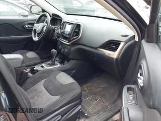 2016 Jeep Cherokee Sport with VIN 1C4PJMAB0GW175813, listed as a IAAI auction lot 42253052 with 98,840 mi miles and . Bid and sale history available at DreamBid. Image 5.